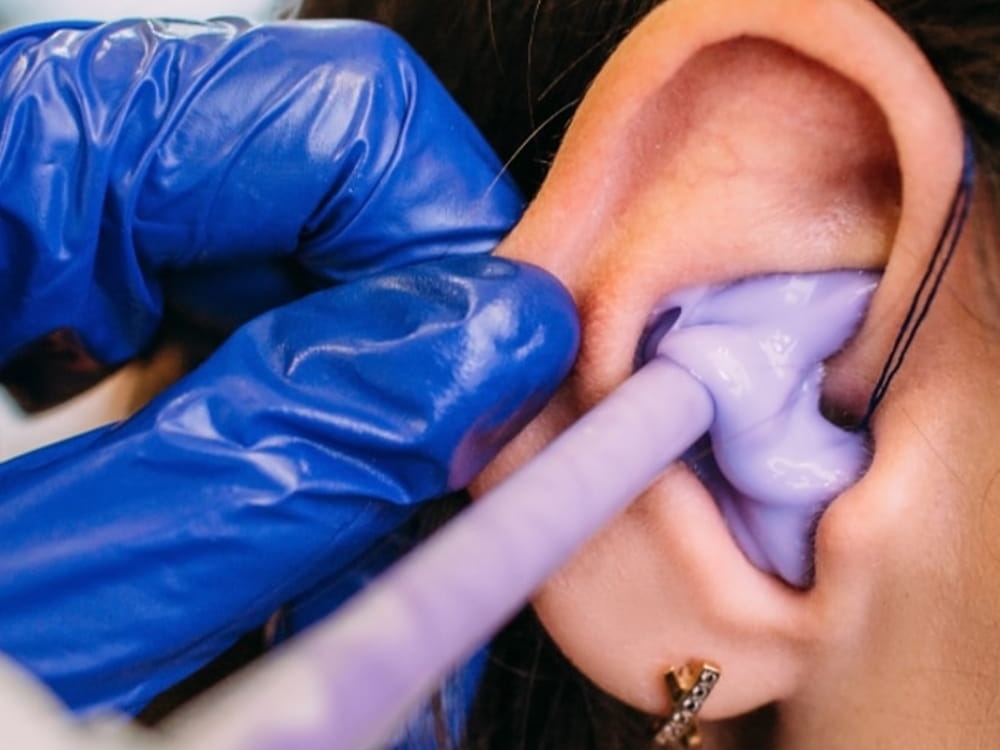 Doctor of Audiology taking a custom ear impression for hearing protection at Brighter Hearing in Savannah, GA